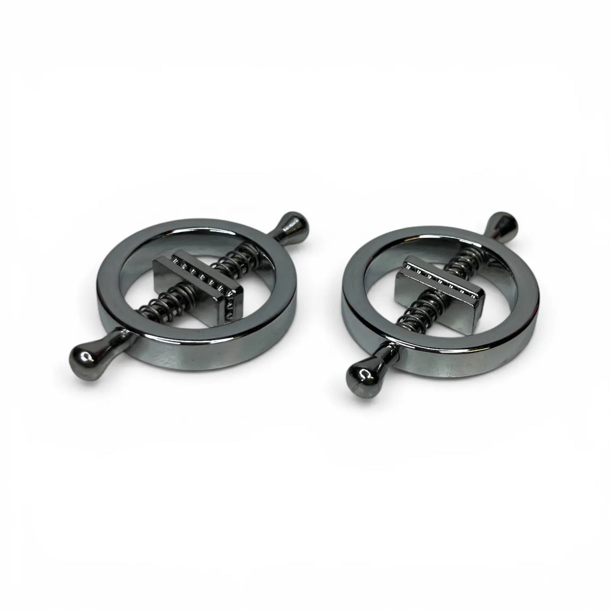 Justerbare Brystklyper i Metall